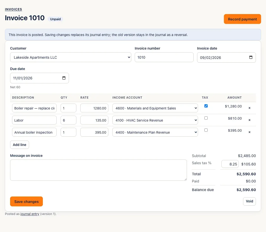 A posted, unpaid invoice: a note that saving replaces its journal entry, the lines and totals with Paid and Balance due, Save changes, Void, and Record payment
