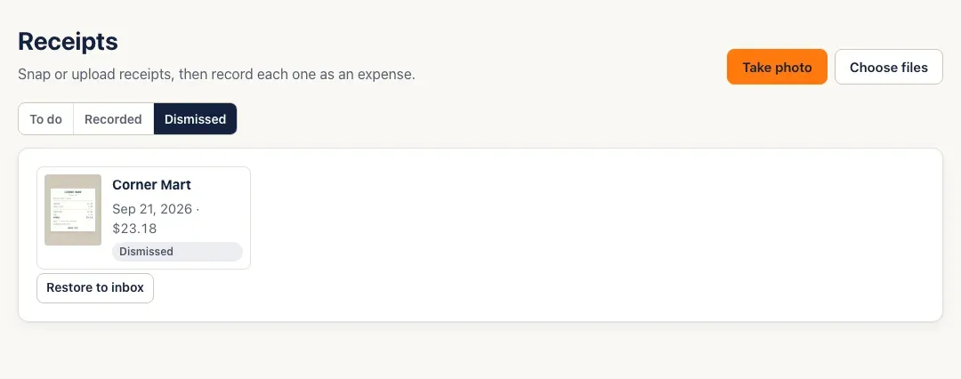 The Dismissed tab: a Corner Mart receipt marked Dismissed with a Restore to inbox button